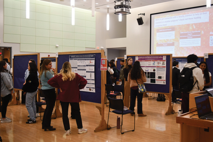 Students present their research during the Fall Frontier Research exhibition. (Daily Campus Photo)