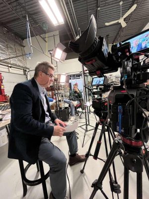 Professor Zeljko Mirkovic on a set filming.